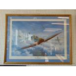 A framed print of a spitfire