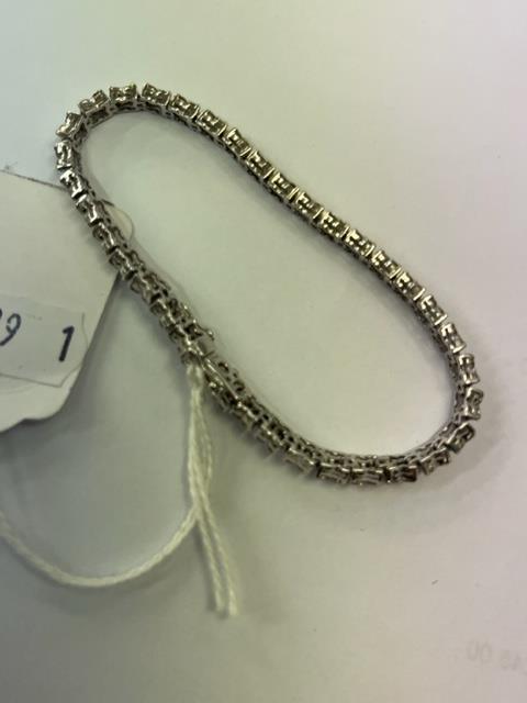 An 18ct White gold Diamond line bracelet, 140 Diamonds in total, - Image 9 of 11