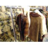 Four MInk stoles