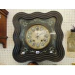 A 19th century carved and Mother of Pearl wall clock