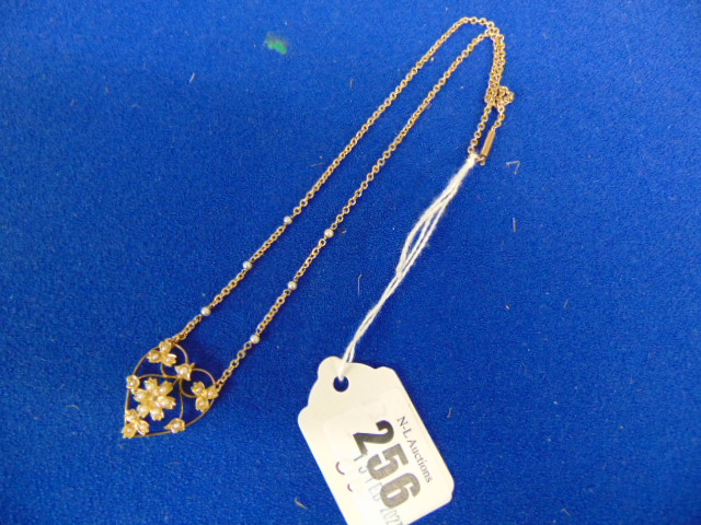 An 18ct Gold and seed Pearl necklace,