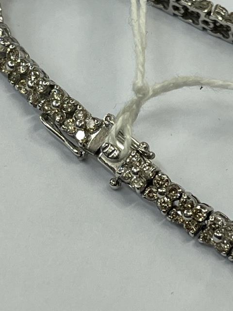 An 18ct White gold Diamond line bracelet, 140 Diamonds in total, - Image 2 of 11
