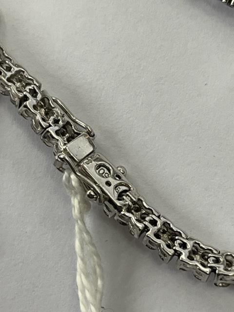 An 18ct White gold Diamond line bracelet, 140 Diamonds in total, - Image 7 of 11