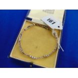 A 9ct Gold and Diamond bracelet, inc.