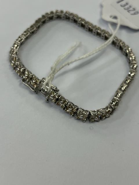 An 18ct White gold Diamond line bracelet, 140 Diamonds in total, - Image 4 of 11