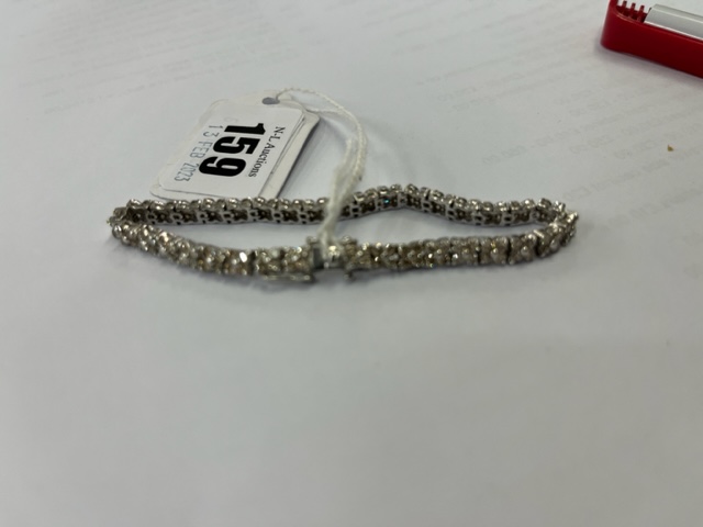 An 18ct White gold Diamond line bracelet, 140 Diamonds in total, - Image 10 of 11