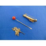 A Silver flower brooch, cocktail stick etc.