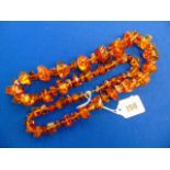 An Amber beaded necklace, approx.