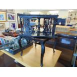 A Mahogany revolving bookcase