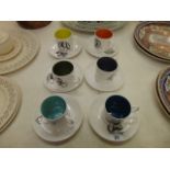 A set of six Susie Cooper coffee cups and saucers,