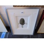 A Silver coloured framed photo of an Acorn