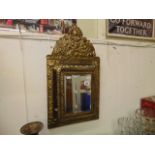 A gilt hall mirror,