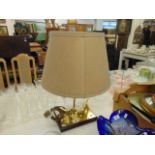 A figural dog table lamp