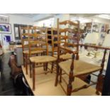 Five ladder back chairs