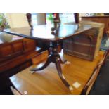 A 19th century Mahogany tilt top table