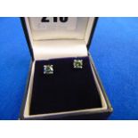 A pair of 18ct Gold, Blue Diamond earrings 1.
