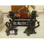 A pair of good quality figural Bronze candle sticks