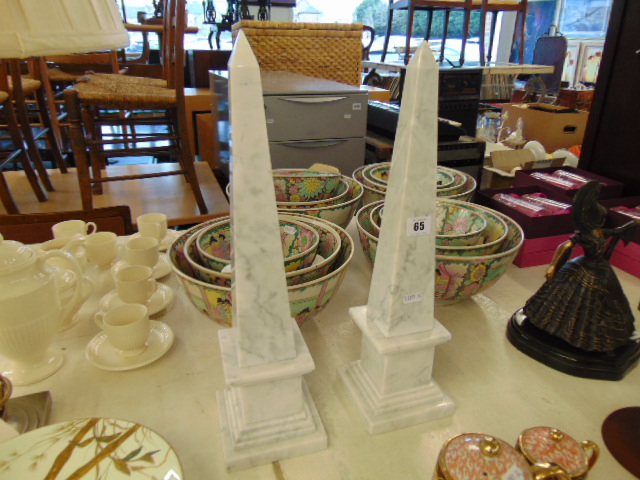 A pair of marble obelisks