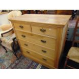 A Satin Walnut chest of five drawers