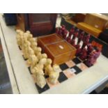 A Chess board and two sets