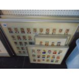 Seven sets of framed and glazed card collections, sporting, film stars etc.