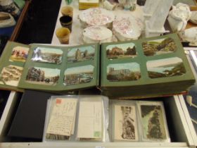 A large post card album containing 700 assorted Edwardian and later postcards,