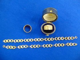 A qty of 18ct Gold, two rings and bracelet,