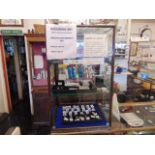 A small glass counter top display cabinet