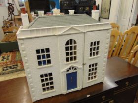 A dolls house and contents