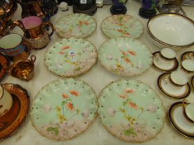 Six decorative Limoges plates and one bowl