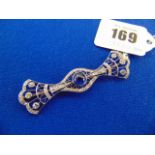 An Edwardian Sapphire and diamond bar brooch,