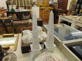 A pair of marble obelisks