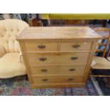 A Satin Walnut chest of five drawers