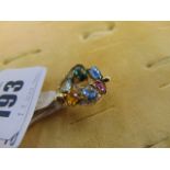 An 18ct GOld multi gem set and Diamond ring,