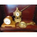 A brass decorative clock,