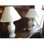 A pair of marble lamps,