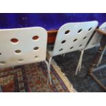 Four modern stacking chairs,