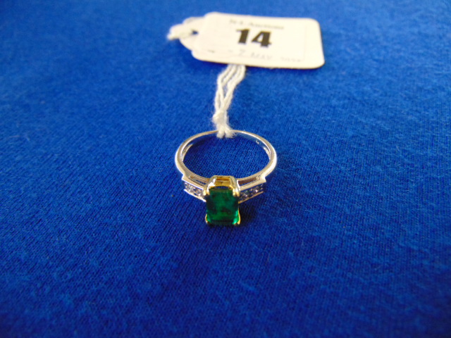 An 18ct White and Yellow Gold, EMerald and Diamond ring,