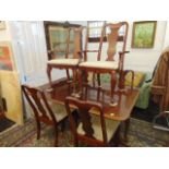 A dining table and six chairs,