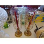 A pair of wind proof candlesticks