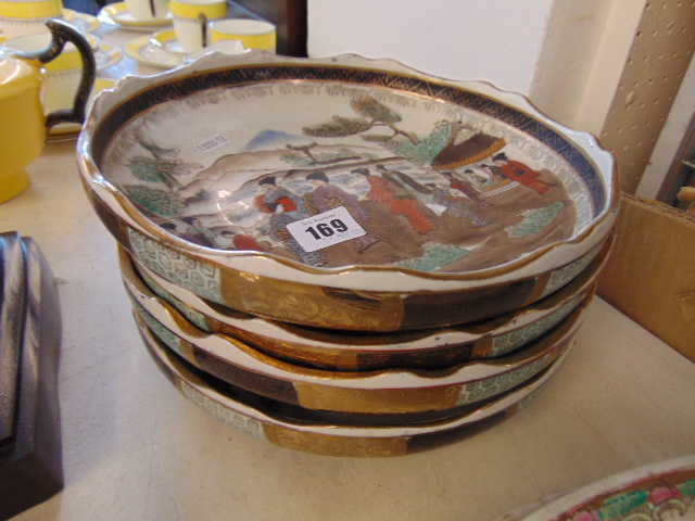 Four Porcelain flat dishes