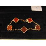 A Van Cleef and Arpels Alhambra 18ct Gold bracelet set with Cornelian