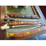 An antique Kris swords plus two others