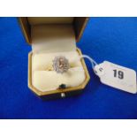 A hallmarked 18ct Gold Diamond cluster ring, centre stone 2.