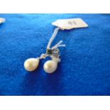 A pair of 18ct White Gold Blue Diamond and Pearl earrings