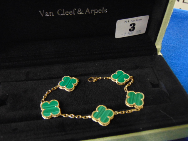 A Van Cleef and Arpels Alhambra 18ct Gold bracelet set with Malachite