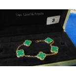 A Van Cleef and Arpels Alhambra 18ct Gold bracelet set with Malachite