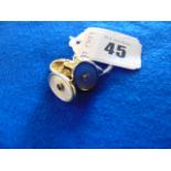 A pair of 18ct Gold cuff links, set with Sapphire, Diamond centre set on Mother of Pearl,