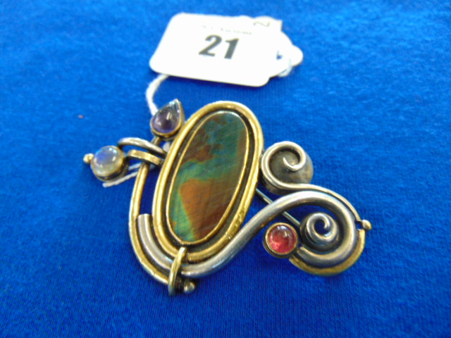 An unusual Silver designer brooch, set with large Labradorite, Moonstone,