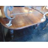 An extending Mahogany dining table